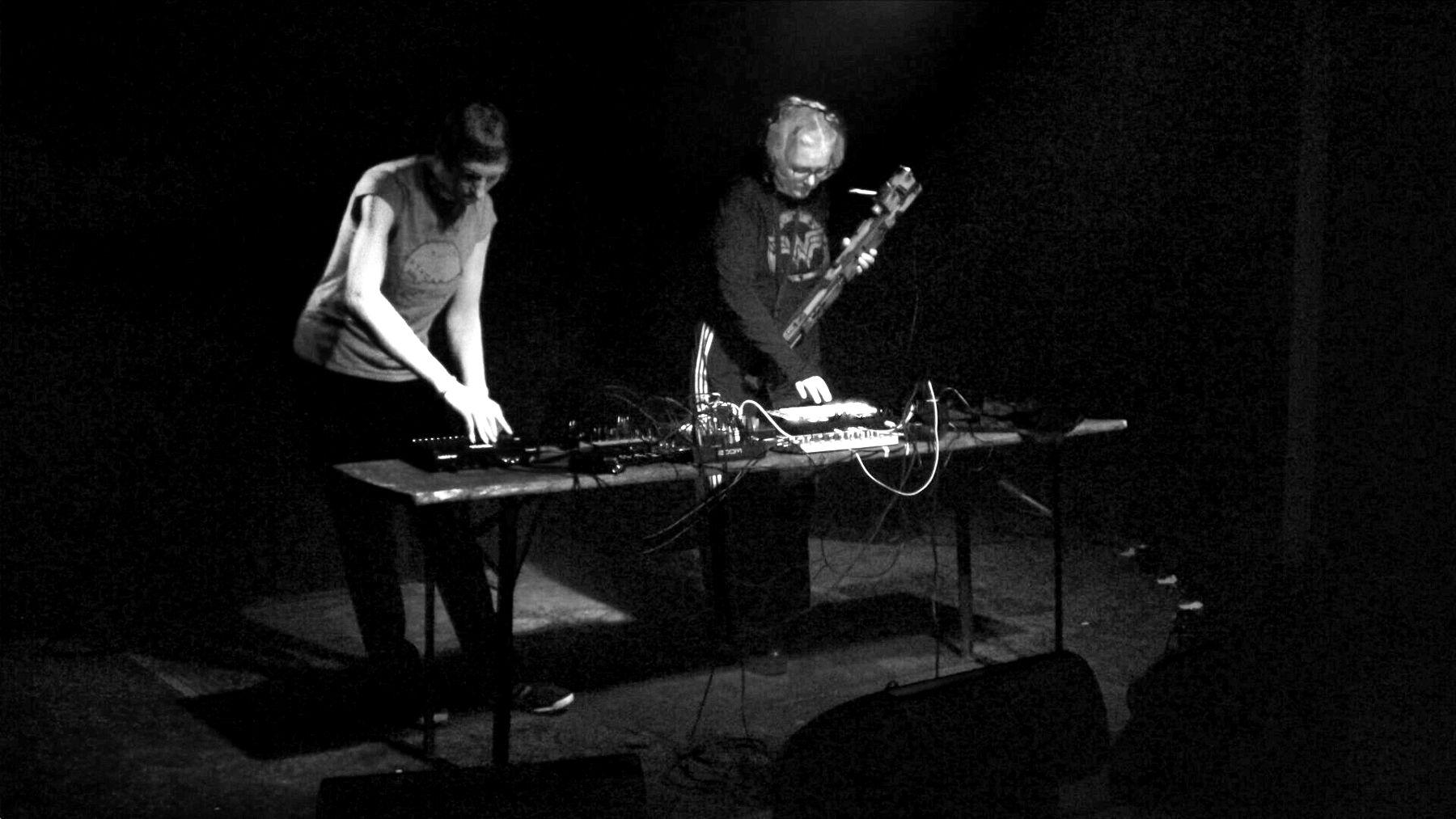 Catenation on a dark stage in red and blue light